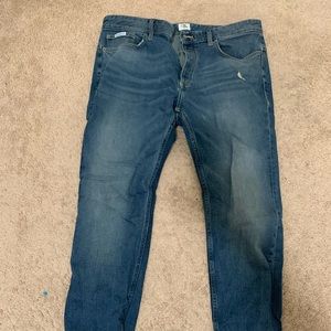 Calvin Klein skinny mid-wash slight rip jeans